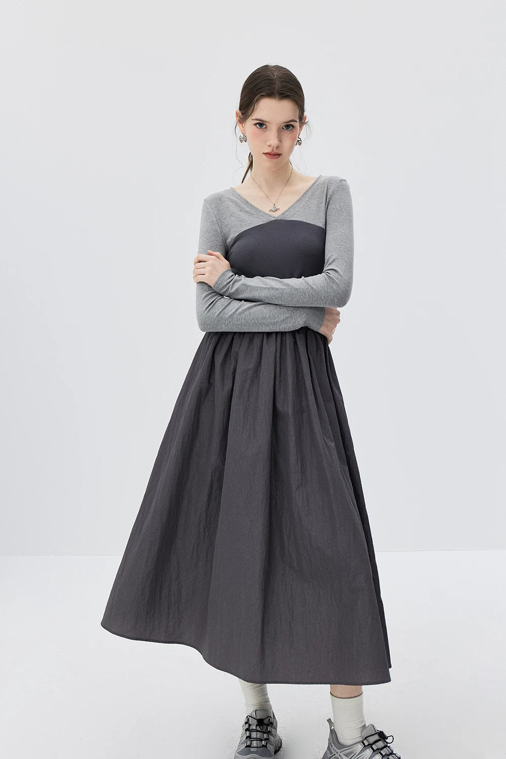 Grey Duo-tone Long-Sleeve Dress with Cinched Waist and Flowy Pleated Skirt