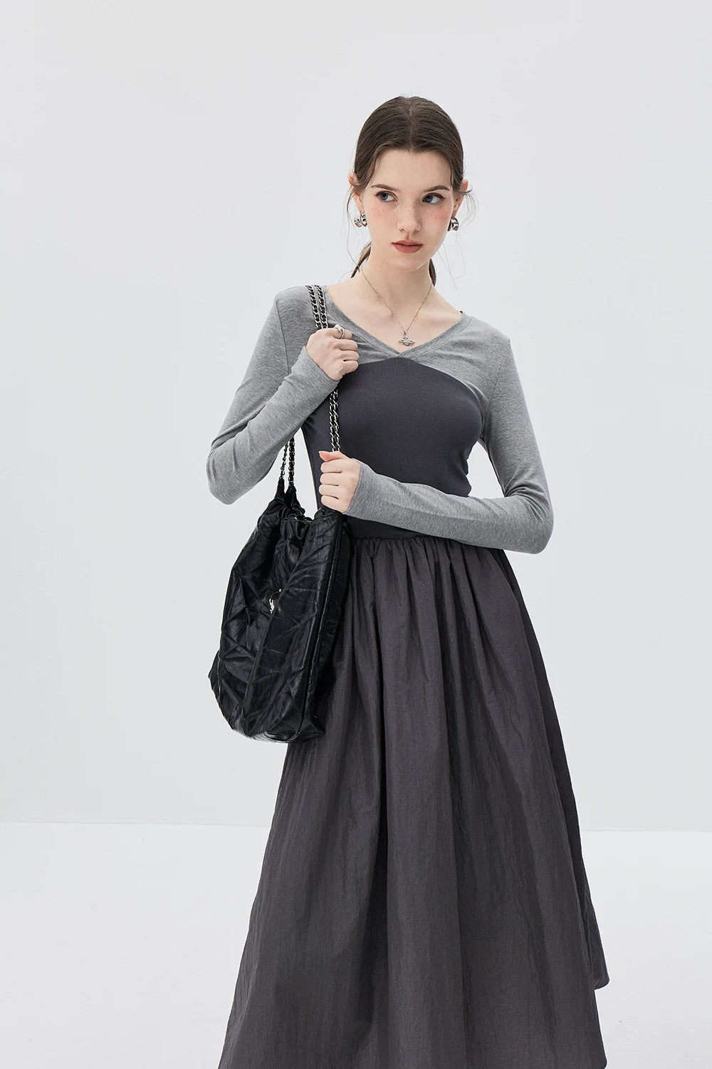 Grey Duo-tone Long-Sleeve Dress with Cinched Waist and Flowy Pleated Skirt