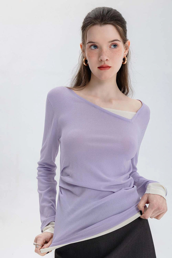 Top da donna in maglia arricciata con scollo asimmetrico