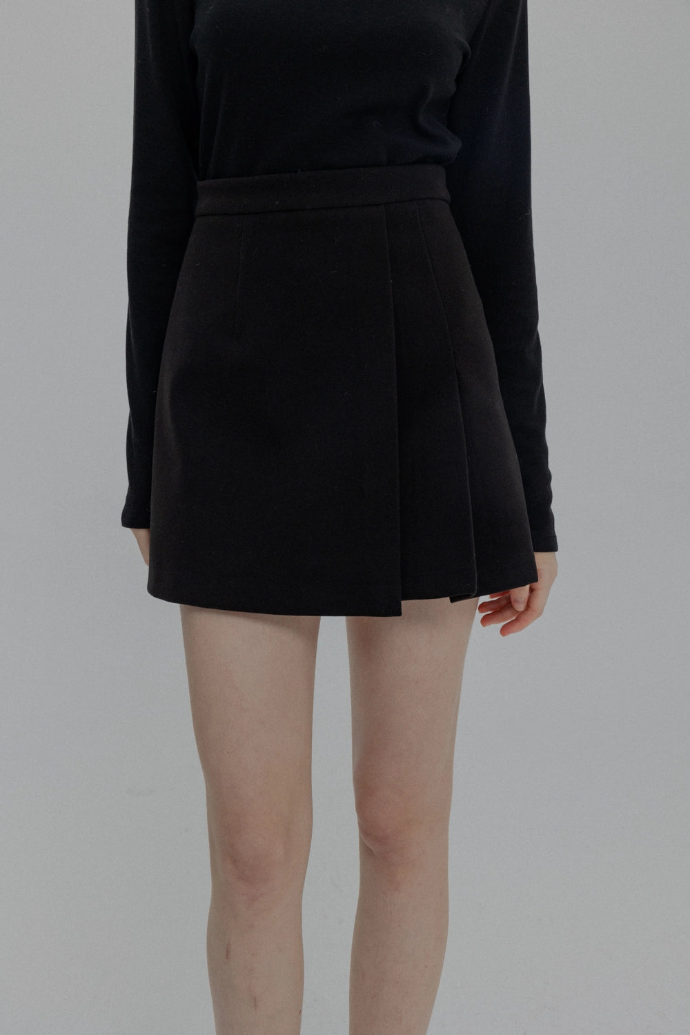 Sleek High-Waisted Flared Mini Skirt