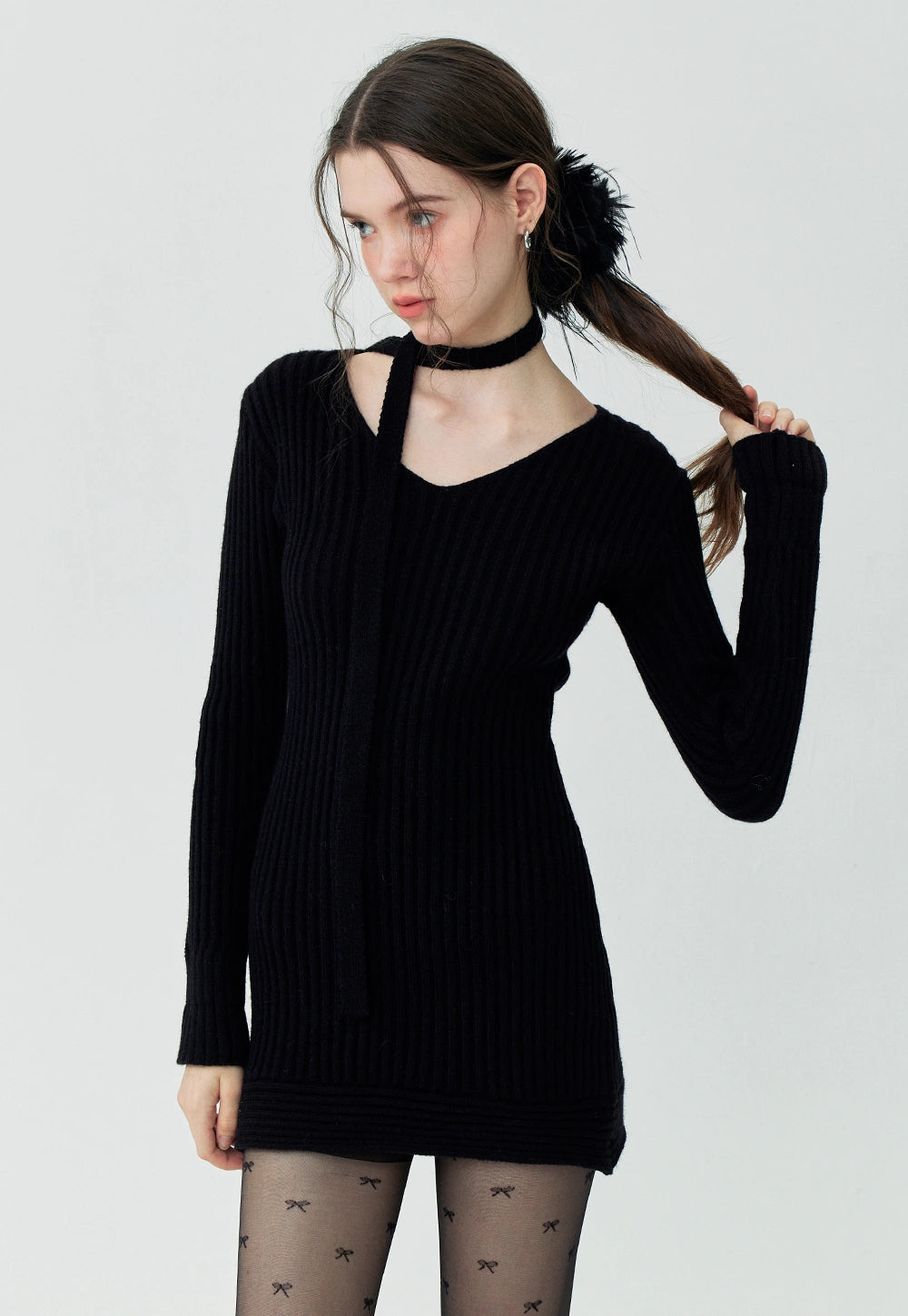 Sleek Black Ribbed Knit Dress with Unique Neckline Detail