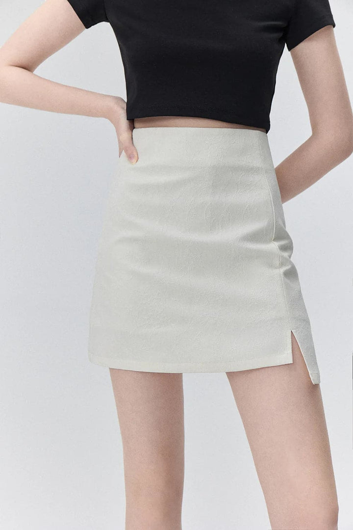 Mini-jupe texturée chic avec un évasement subtil