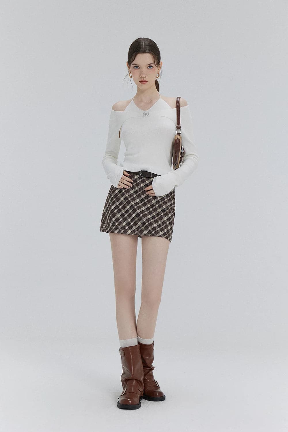 Chic Cut-Out Knit Top with Tie Detail – A Fresh Take on Casual Elegance