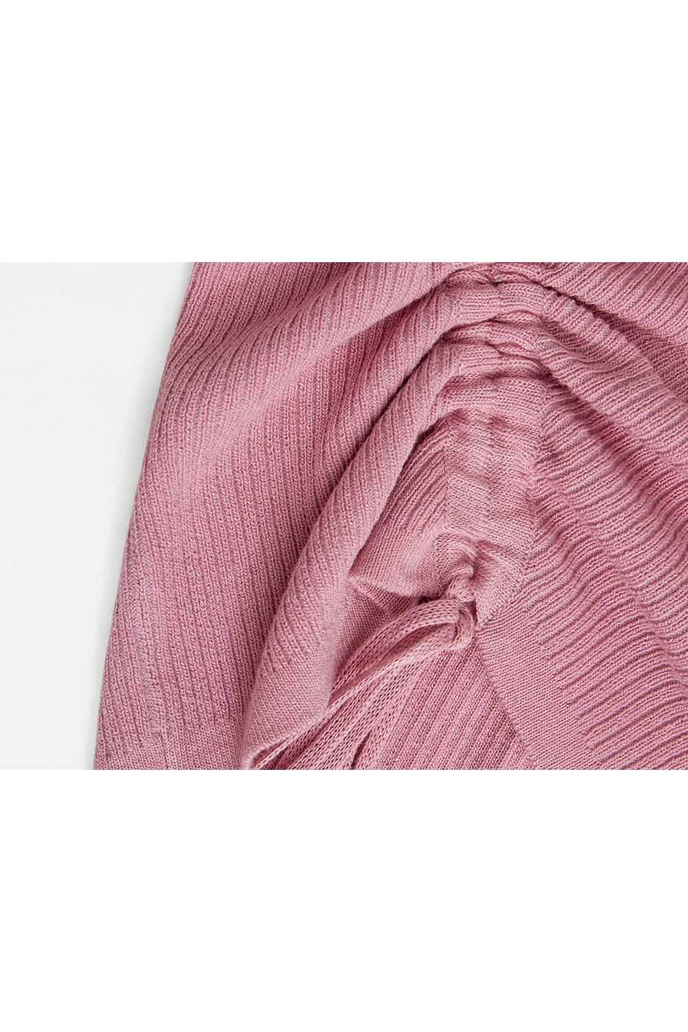 비대칭 컷아웃과 사이드 타이 디테일이 돋보이는 여성용 시크 니트 스웨터