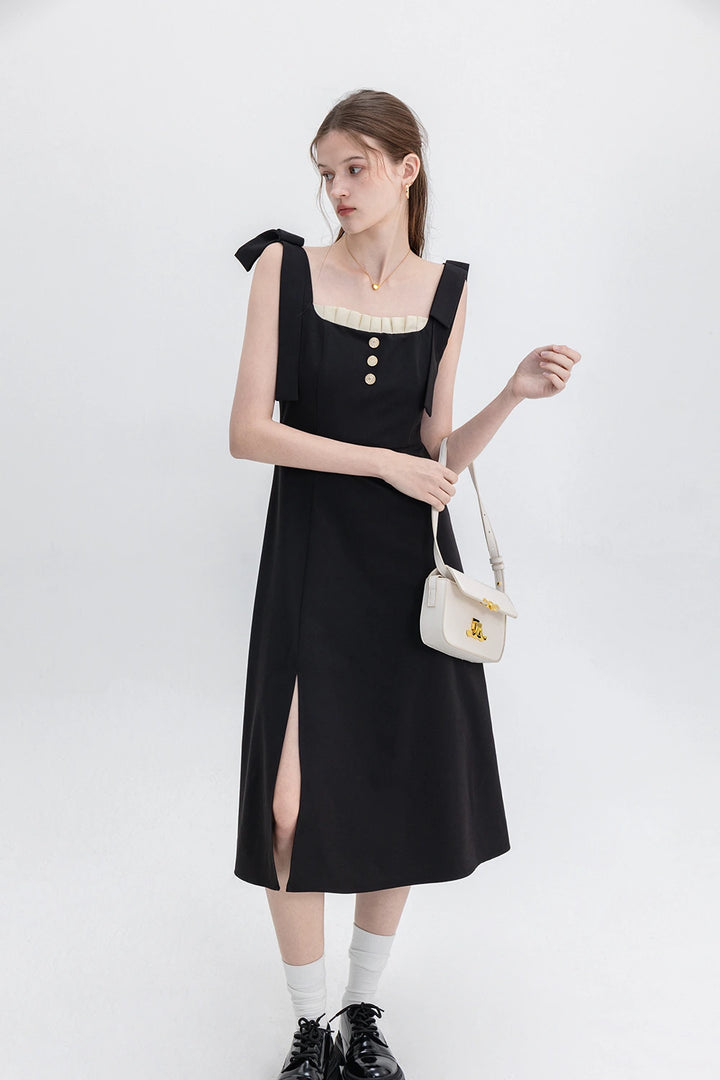 Sophisticated Black Dress with Button Accents and Shoulder Straps