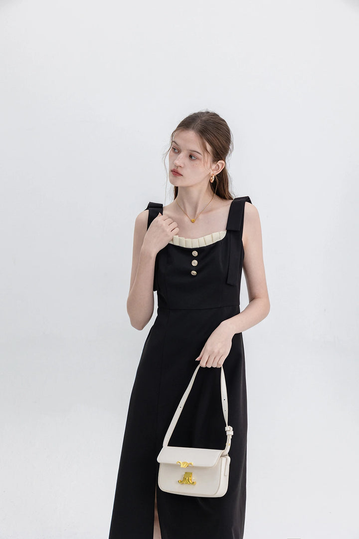 Sophisticated Black Dress with Button Accents and Shoulder Straps