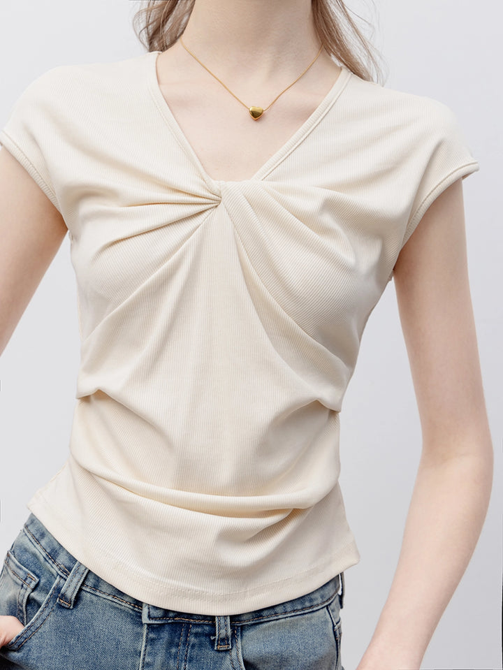 Top casual de manga corta con cuello redondo para mujer con elegante detalle de nudo frontal