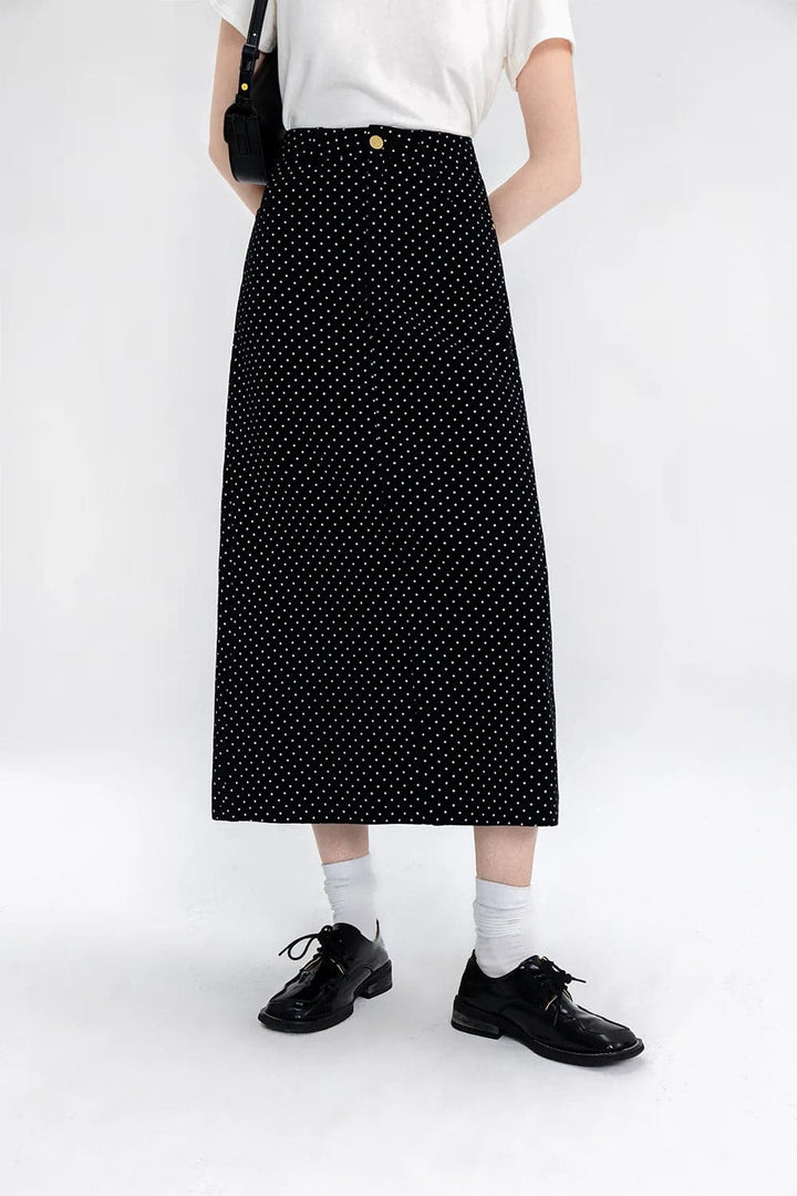 Falda midi evasé elegante con lunares