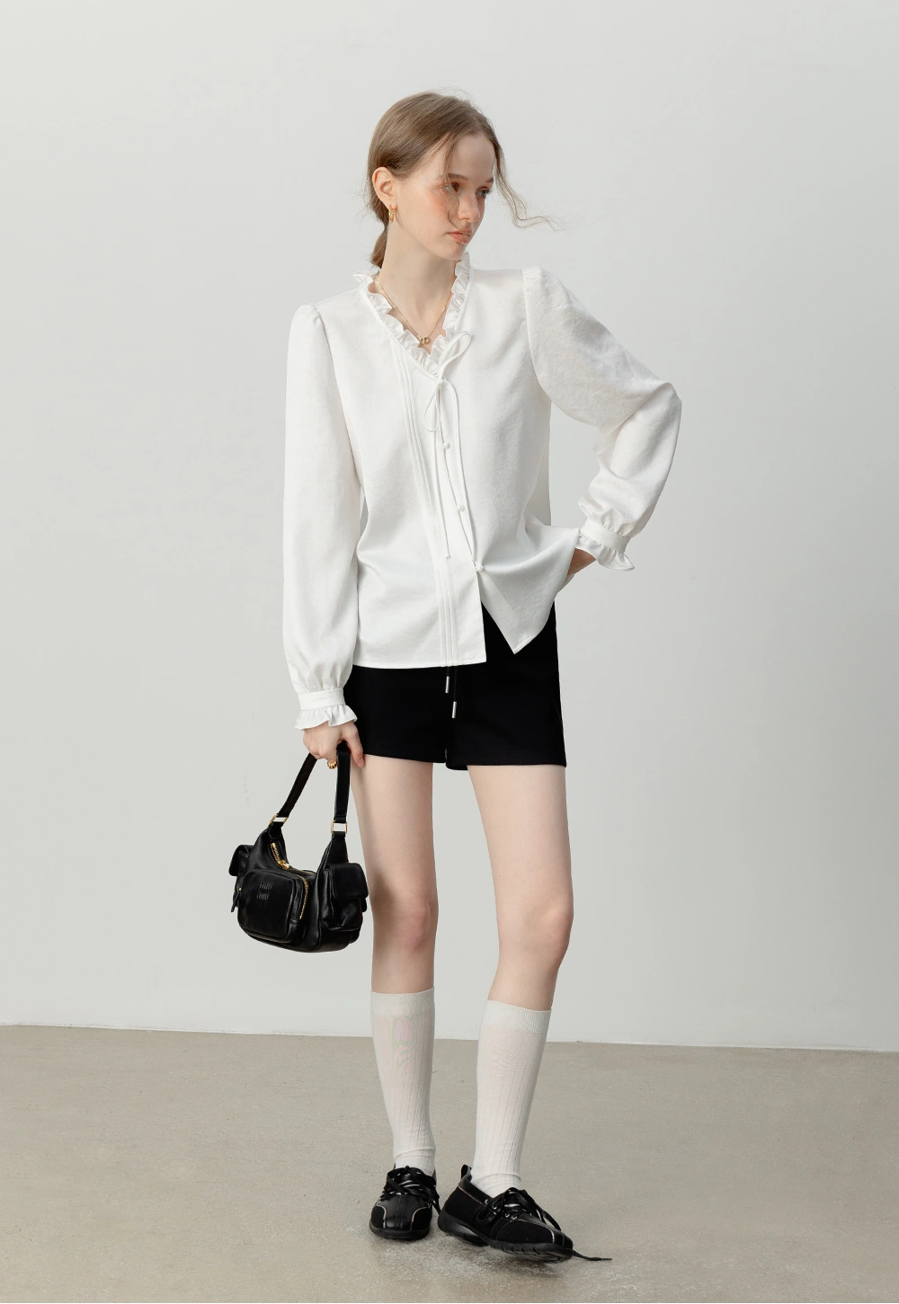 Women's Ruffled White Blouse with Bow Tie Detail