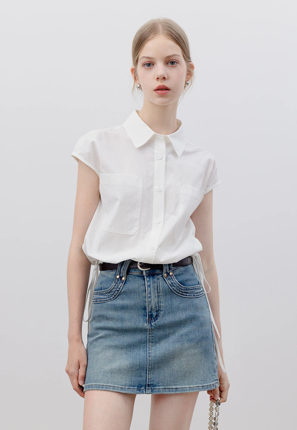 Women's White Sleeveless Button-Down Blouse