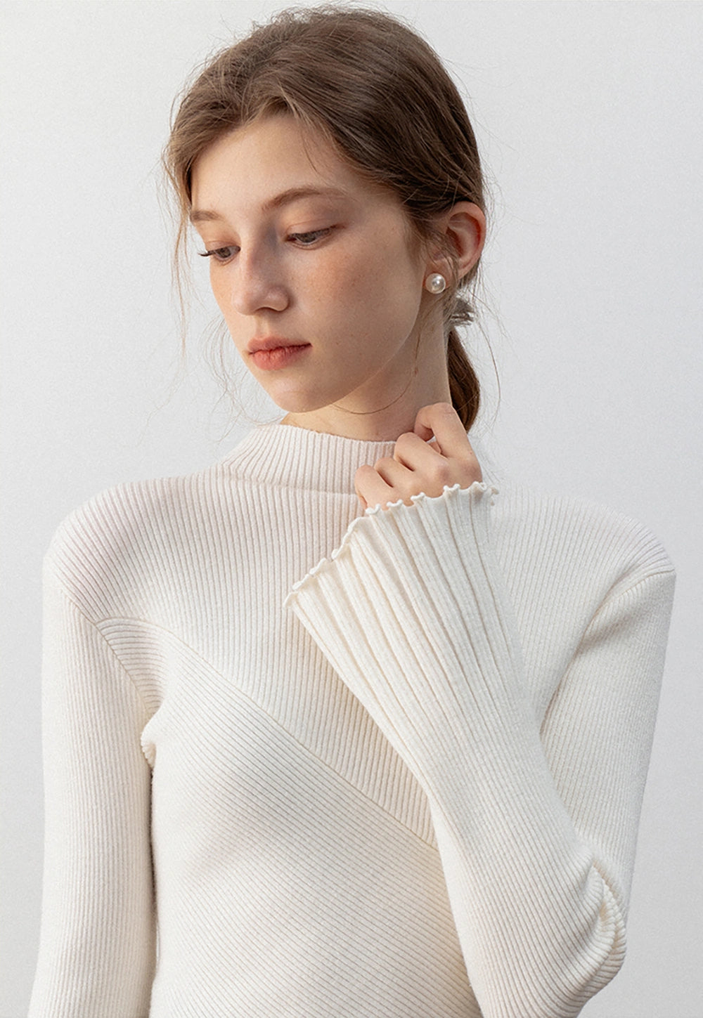 Ribbed High- Neck Sweater with Flared Sleeves