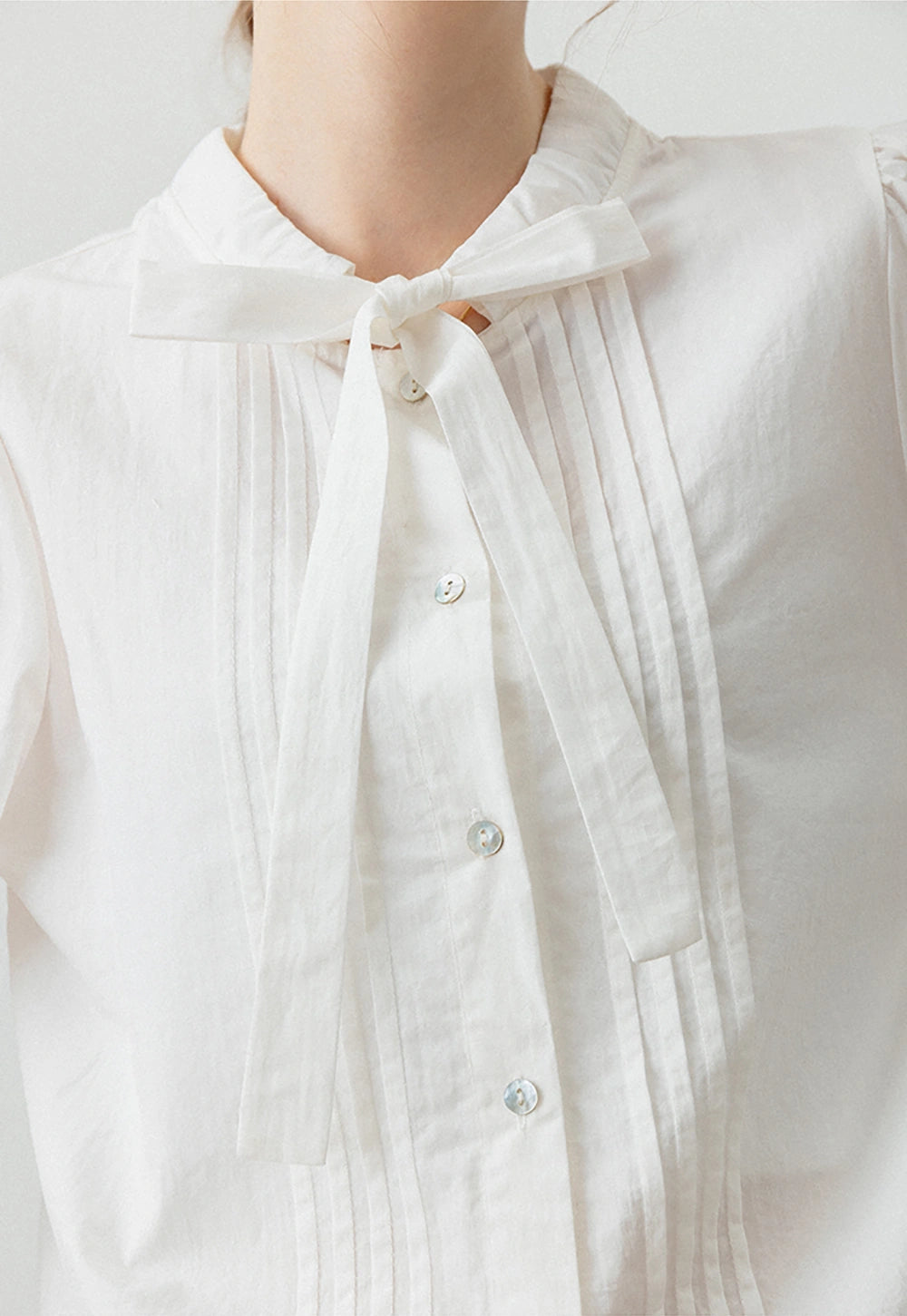 Women's Inspired Puff Sleeve Blouse with Bow Detail