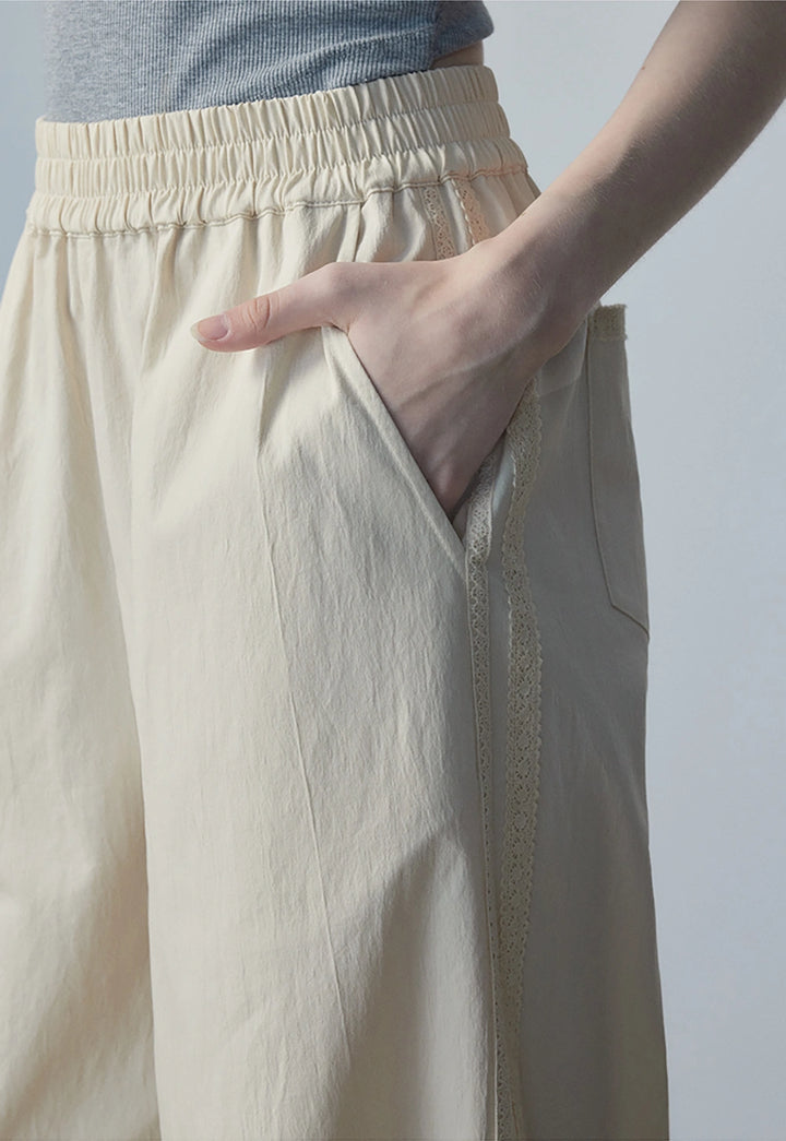 Pantalones anchos beige para mujer