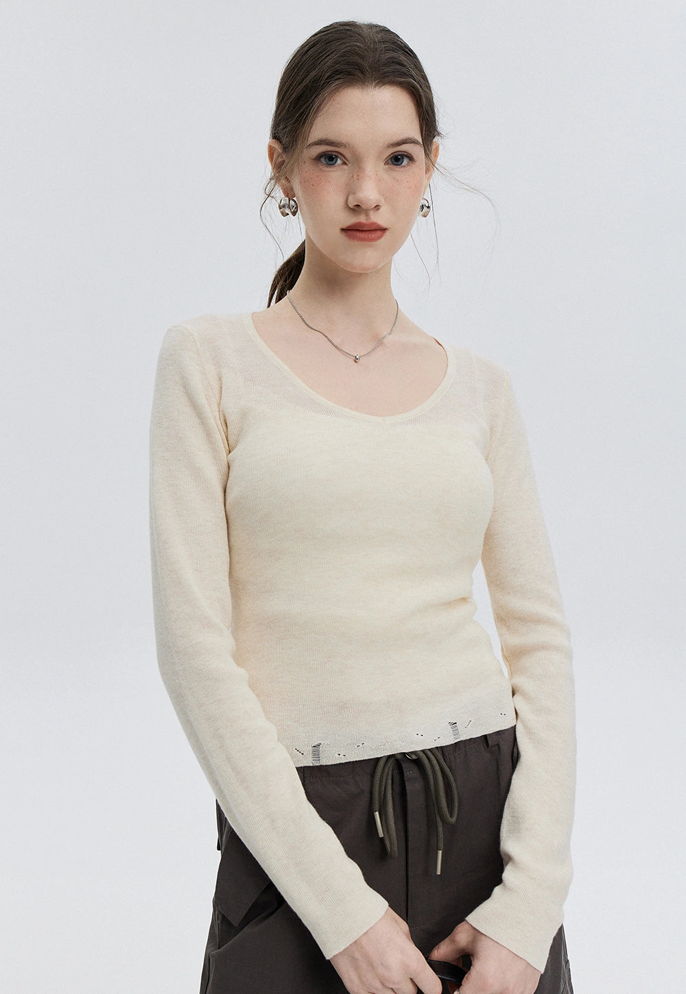 Classic Long Sleeve Knit Top with V-Neck Design