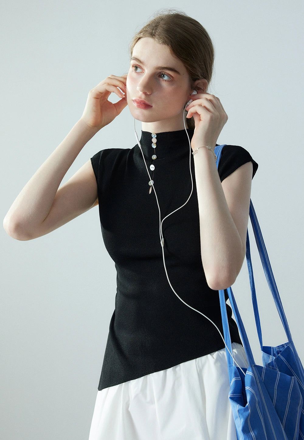 Women's Asymmetrical Sleeve Knit Top