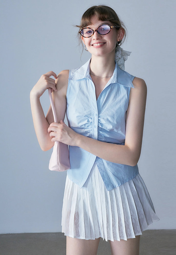 Blouse froncée sans manches pour femmes