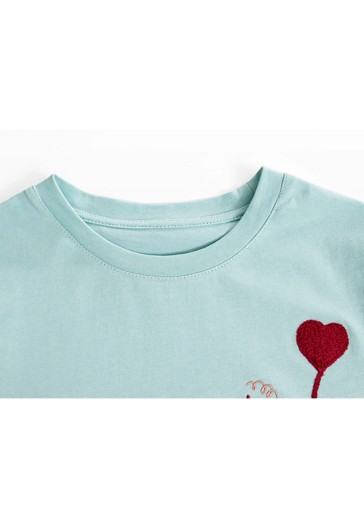 Women's Graphic Tee with Dog and Heart Balloon Design