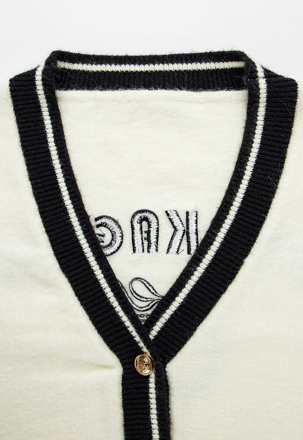 White Knit Cardigan with Black Trim