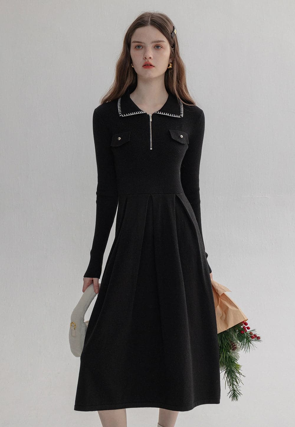 Elegante vestido midi de punto de manga larga con ribete negro y detalle de cremallera: comodidad con estilo