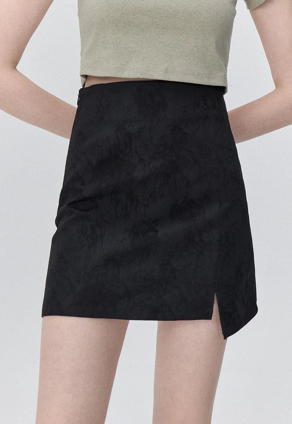 Mini-jupe texturée chic avec un évasement subtil